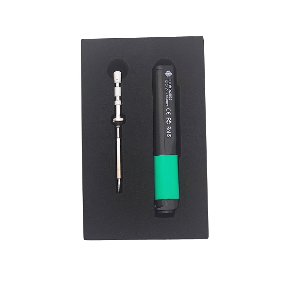 Pinecil packaged in foam insert Pinecil soldering iron in open foam packaging