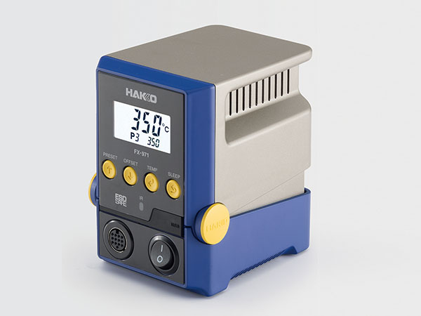 Hakko FX-971 soldering station with dark blue front panel LCD display showing 350°C and yellow control buttons