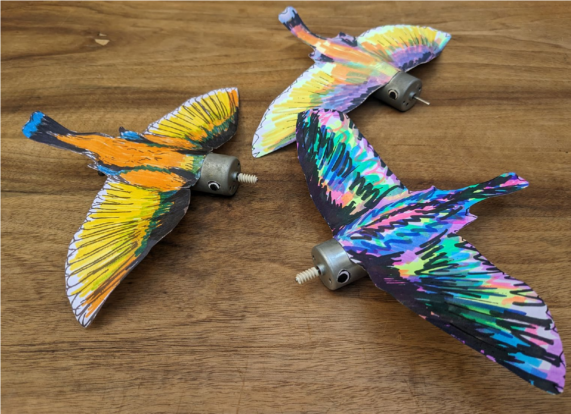  Motoerboerd – colorful flock of birds as a graphic design element