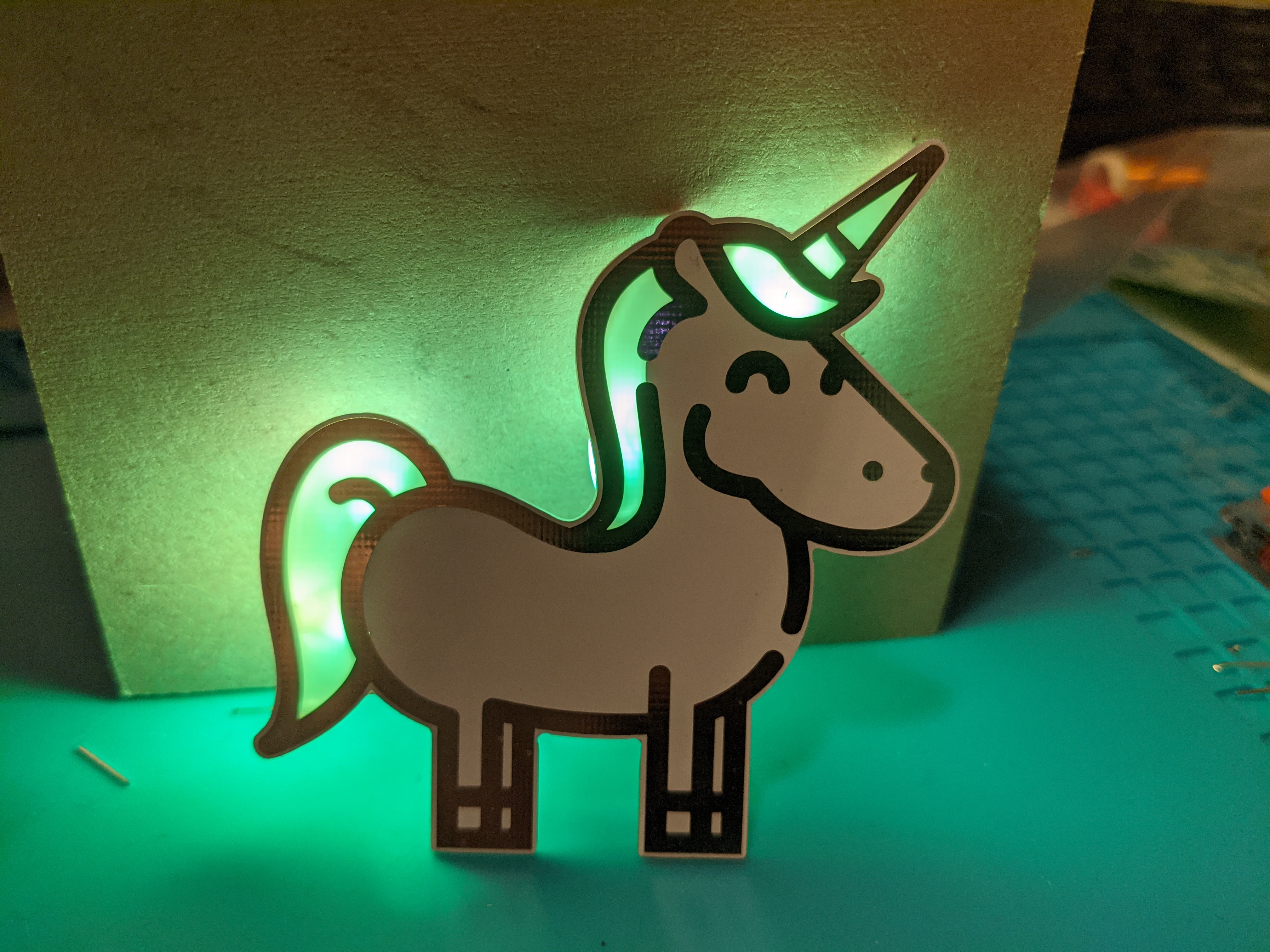 Unicorn kit – front view with green glowing tail, mane and horn